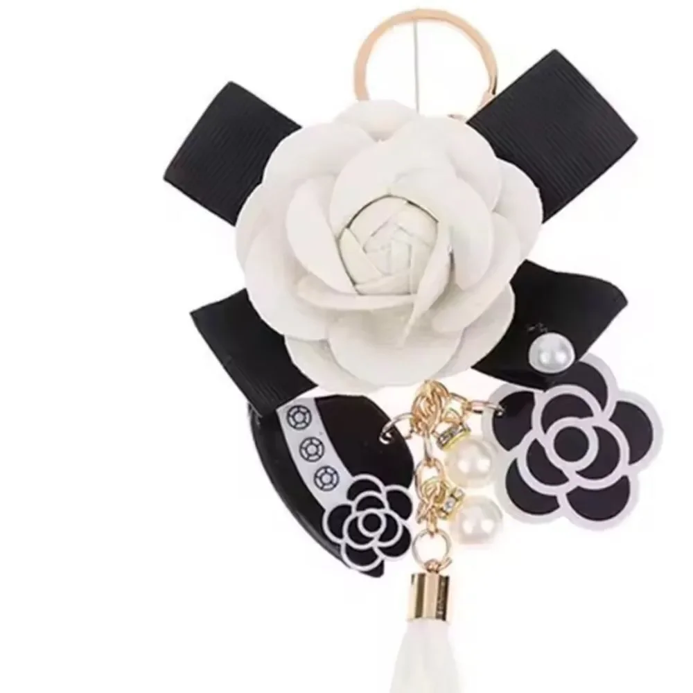 Elegant Black and White Floral Keychain